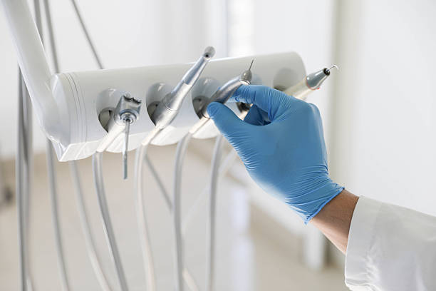 Professional Tooth Extraction technician working in Lochsloy, WA